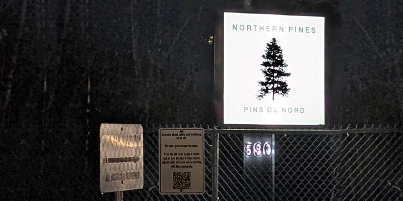 Northern pines gate's QR signage QR code signage at night