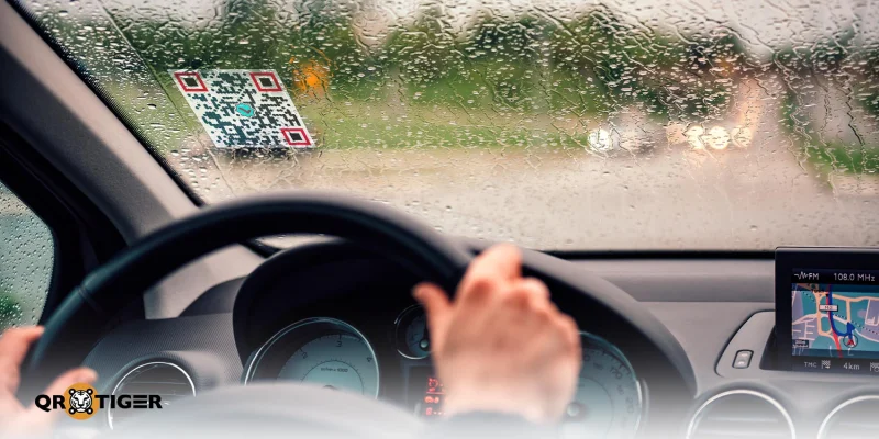 Waterproof QR code sticker on rainy windshield